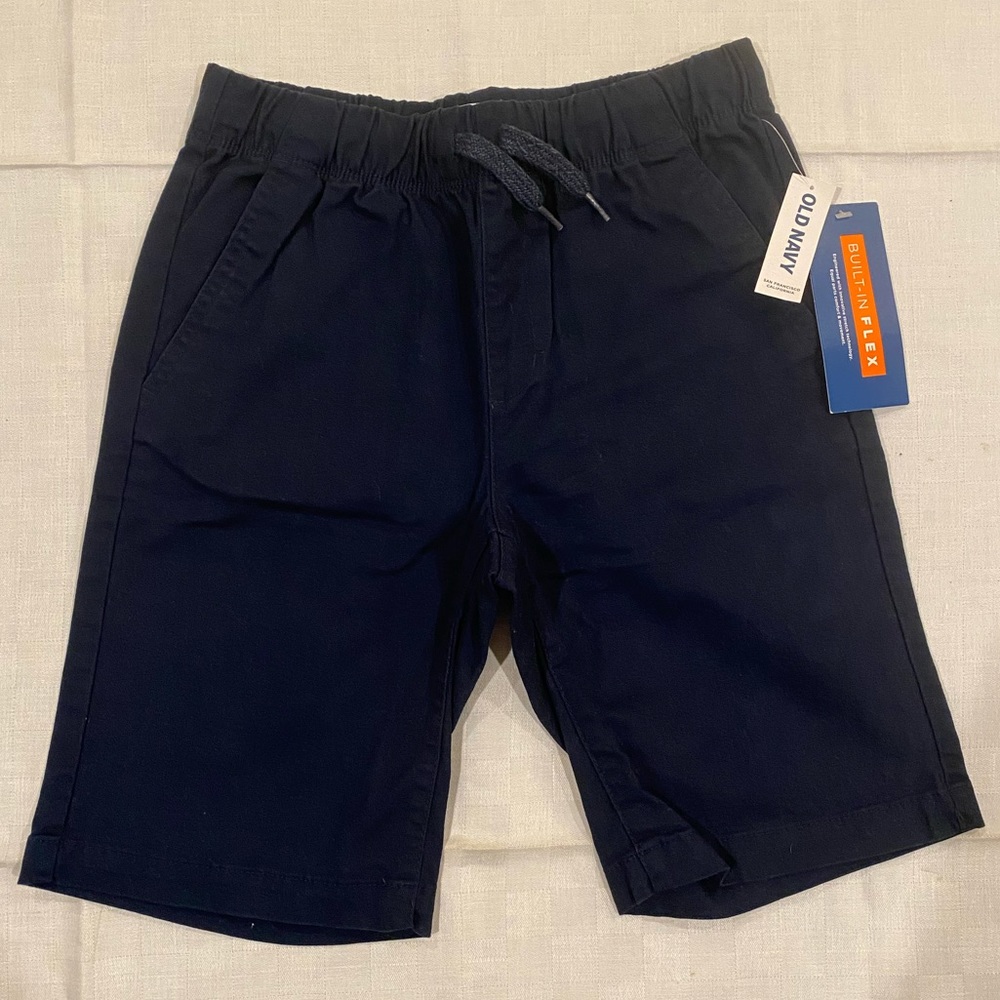 Navy blue shorts with 9” inseam from Old Navy. Boys size 10-12. Brand new.